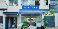 Route - Cafe and Petit Hostel Hotel a 