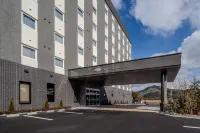 HOTEL ROUTE-INN OKAYAMA MANIWA فنادق في 