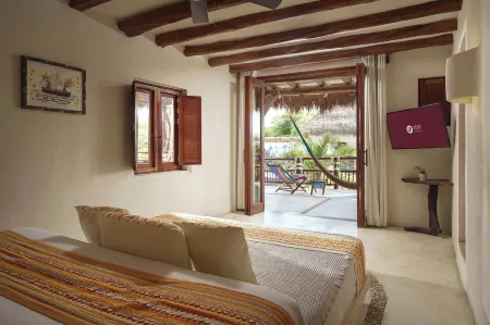 Exe El Pueblito Отели рядом с достопримечательностью «Columpios Casa Punta Cocos»