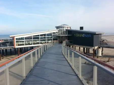 Ameland - apartment with balcony to the south side with a view of meadows and the village of Buren