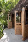 An exclusive jungle hideaway just steps from Plaza and the beach