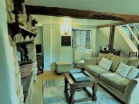 A Quaint Grade 11 Listed Detached Stone Cottage In Lower Slaughter with parking.