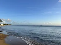 Malecon Beach House with beautiful backyard. Steps from the Caribbean ocean.