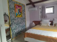 LES FLAMBOYANTS LA PETITE MAISON CRÉOLE Hotels near Pointe du Piton