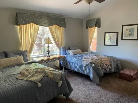 Open Floor Plan and Scenic Front Porch Views - Charming Retreat