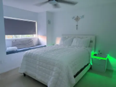 Relax in my calm and stylish space. Enjoy the relaxing lakeview and heated pool.