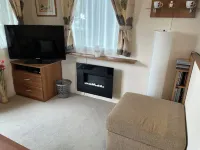 Poppy, dog-friendly caravan with panoramic sea views on Rockley Park Poole wi-fi