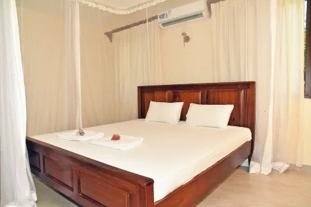 Cozy studio in peaceful Diani located in a leafy and serene neighborhood Отели в г. Мсамбуэни