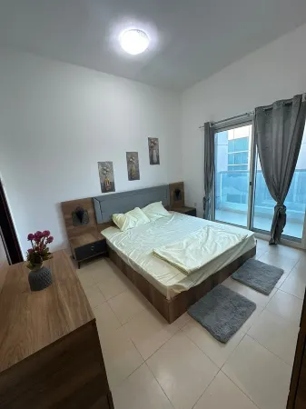 Cozy 2-bedroom apartment in pleasant Ajman with AC, WiFi