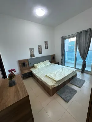 Cozy 2-bedroom apartment in pleasant Ajman with AC, WiFi