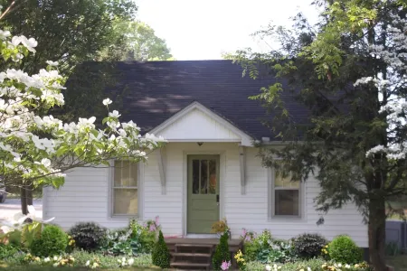 Charming cottage on 65 rolling acres