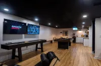 Lake house with a game room