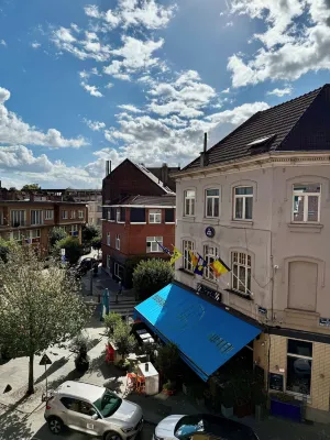 Doux nid perche avec vue magique sur la Ville Hotel a Jette