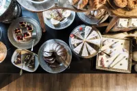 Alpstay - Chalet Hotel Hartmann - Adults Only - petit déjeuner