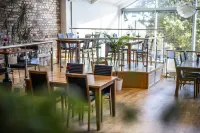 普蘭尼特斯塔登First酒店 - 早餐