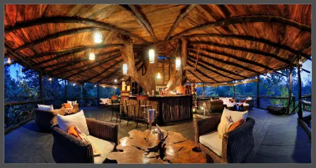 Pugdundee Safaris- Tree House Hideaway Отели в г. Умария
