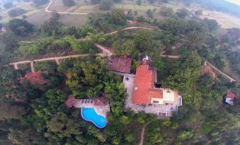 Pugdundee Safaris - Kanha Earth Lodge