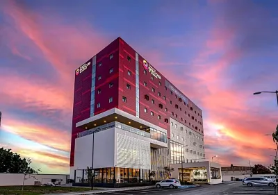 Ramada Encore by Wyndham Guadalajara Aeropuerto Hotels near Walmart Supercenter