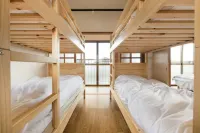 Free Rental of One Building Bonfire Sauna BBQ Hôtels à : Shirako