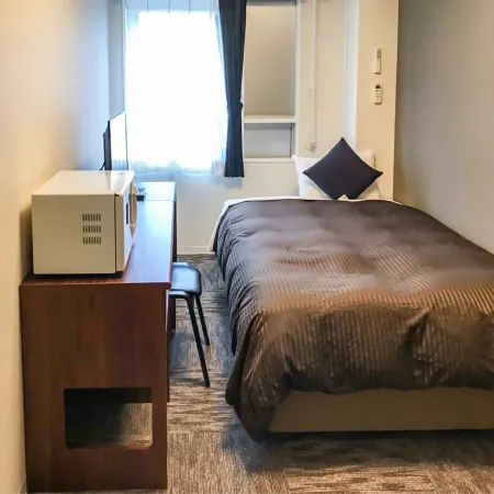 HOTEL LiVEMAX BUDGET Kawasaki Ekimae Отели рядом с достопримечательностью «Железнодорожный вокзал Мизонокучи»