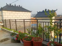Zexu Homestay (Longmen Avenue) - مطابخ