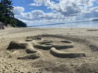 Sandy Beach Front Cottage with great Sunsets