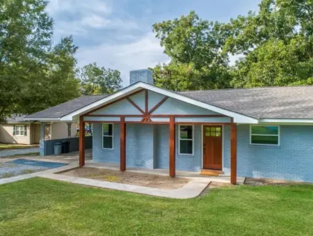 Heron's Cove Lake House with dock and kayaks