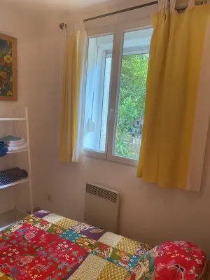 Small flowered house with private garden near town center