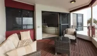 Executive Marina Townhouse Hotels near Seacrest Shopping Centre