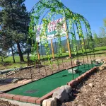 Camper at Minigolf Course COUGAR