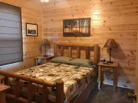 4BR 2 bath house with full kitchen, living room, hot tub and game room.