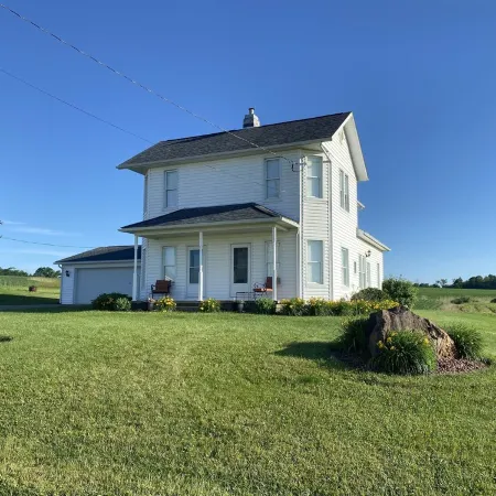 Family owned and operated spacious Farm House with a modern decorative flair.