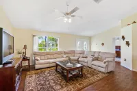 Fenced, private, family friendly villa with exotic poolside views near airport. - Wifi