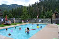 Family condo, walk to ski area, private fishing pond and playground