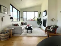 Sunlit loft with fireplace and king bed