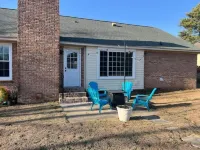 Welcome to “Persimmon Grove” the Cozy Farmhouse with Modern Amenities