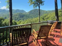 Enjoy the beautiful view of the mountains in your private hot tub!  Pet friendly