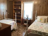 joins the hiking and biking trail. Walk to the river to fish, kayak or relax.