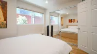 Modern, art-inspired home with parking and patio