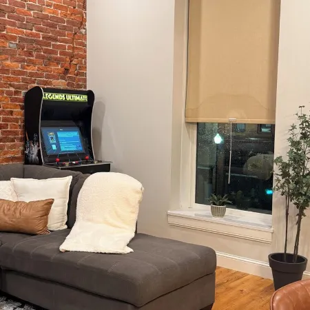 Cozy 1-Bedroom Loft in the Heart of Faribault with Arcades + Sauna & Gym