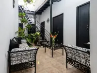 Casa Buenos Aires en Cuba - Habitación con dos camas Hoteles en La Habana