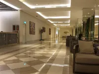Cosmy Orchard Apartment Hotels in Wiyung