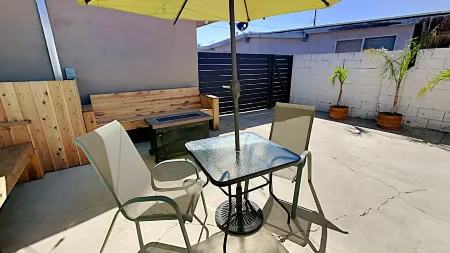 Private Patio and Full Kitchen Amenities - Charming Oasis
