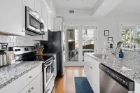 Charming Oasis with Exposed Brick and Modern Kitchen - Elegant Retreat