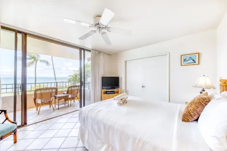 Tropical oceanfront retreat with WiFi, hot tub, pool, and sweeping ocean views