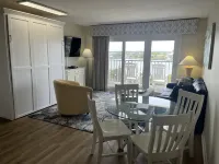 Private Balcony and Modern Kitchenette - Stylish Coastal Escape Hotels in Wrightsville Beach