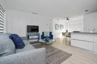 Sleek Kitchen and Cozy Living Area - Inviting Modern Haven Hotels in South Miami Heights