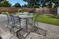 Spacious Backyard and Gourmet Kitchen Amenities - Charming Retreat