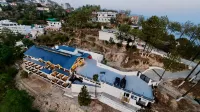 The Dunhill Manor Hotels near Tarkeshwar Mahadev Temple