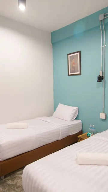 ห้องสแตนดาร์ด เตียงเดี่ยว 2 เตียง (ห้องน้ำรวม)